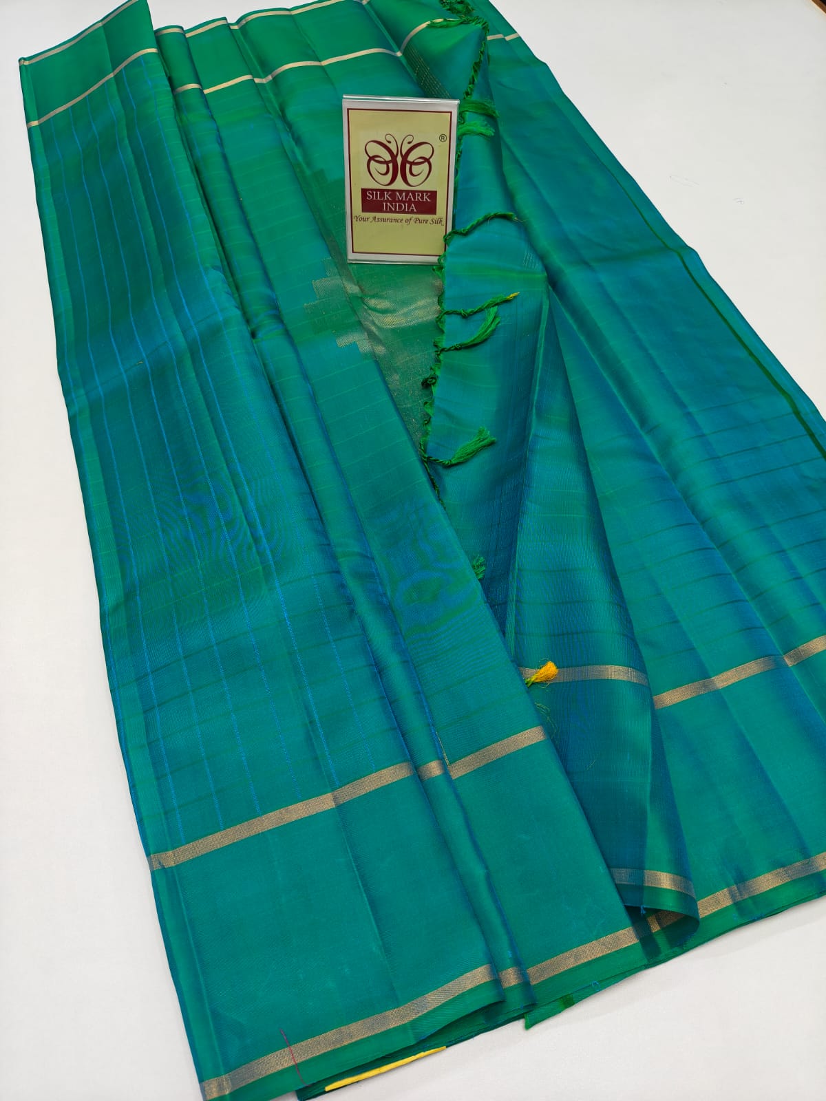 Luminous Peacock Teal Green Self-Checked Pure Silk Kanjivaram Saree with Sleek Gold Zari Border (Silk Mark Certified)