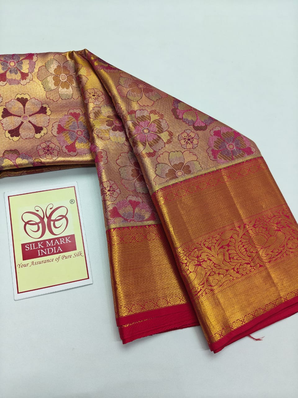 Premium Gold Tissue & Multi-Color Meenakari Floral Pure Silk Kanjivaram Saree with Rani Pink Zari Border (Silk Mark Certified)