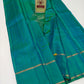 Luminous Peacock Teal Green Self-Checked Pure Silk Kanjivaram Saree with Sleek Gold Zari Border (Silk Mark Certified)