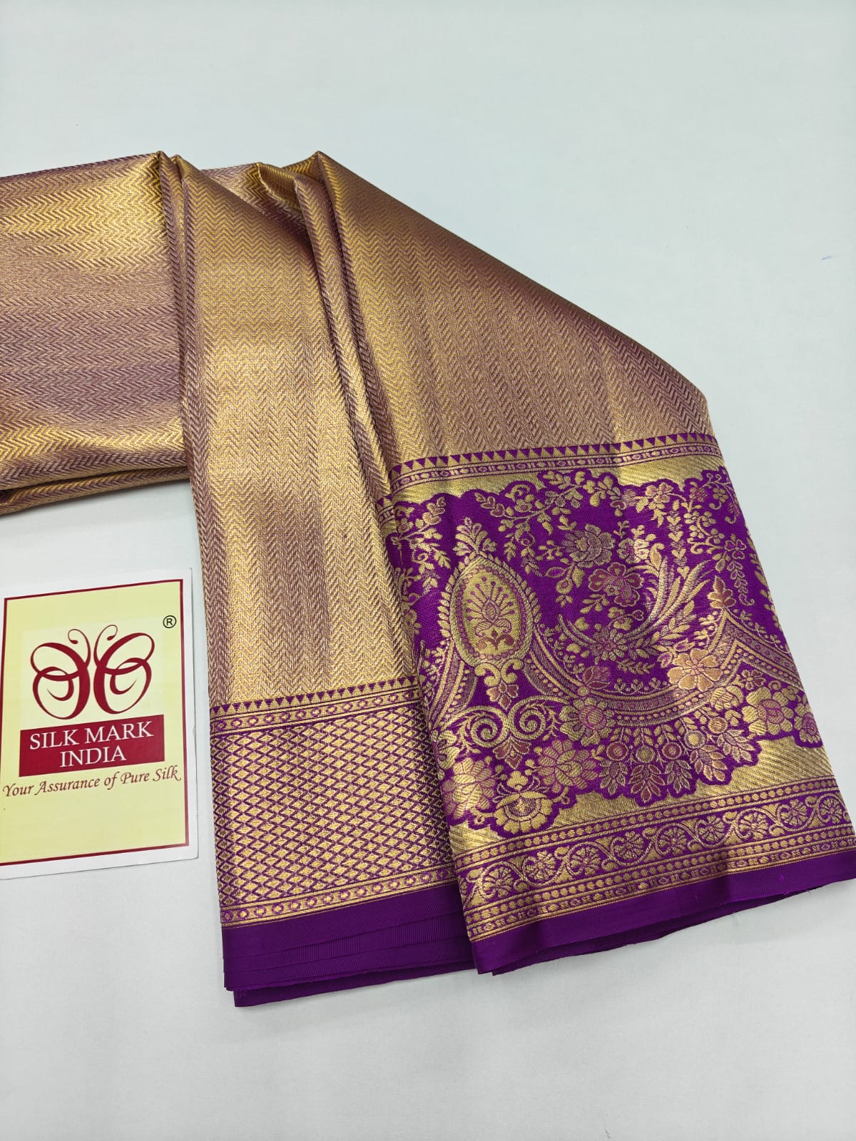 Silk Mark Certified Metallic Gold Tissue Kanjivaram Pure Silk Saree with Royal Purple Peacock Zari Border