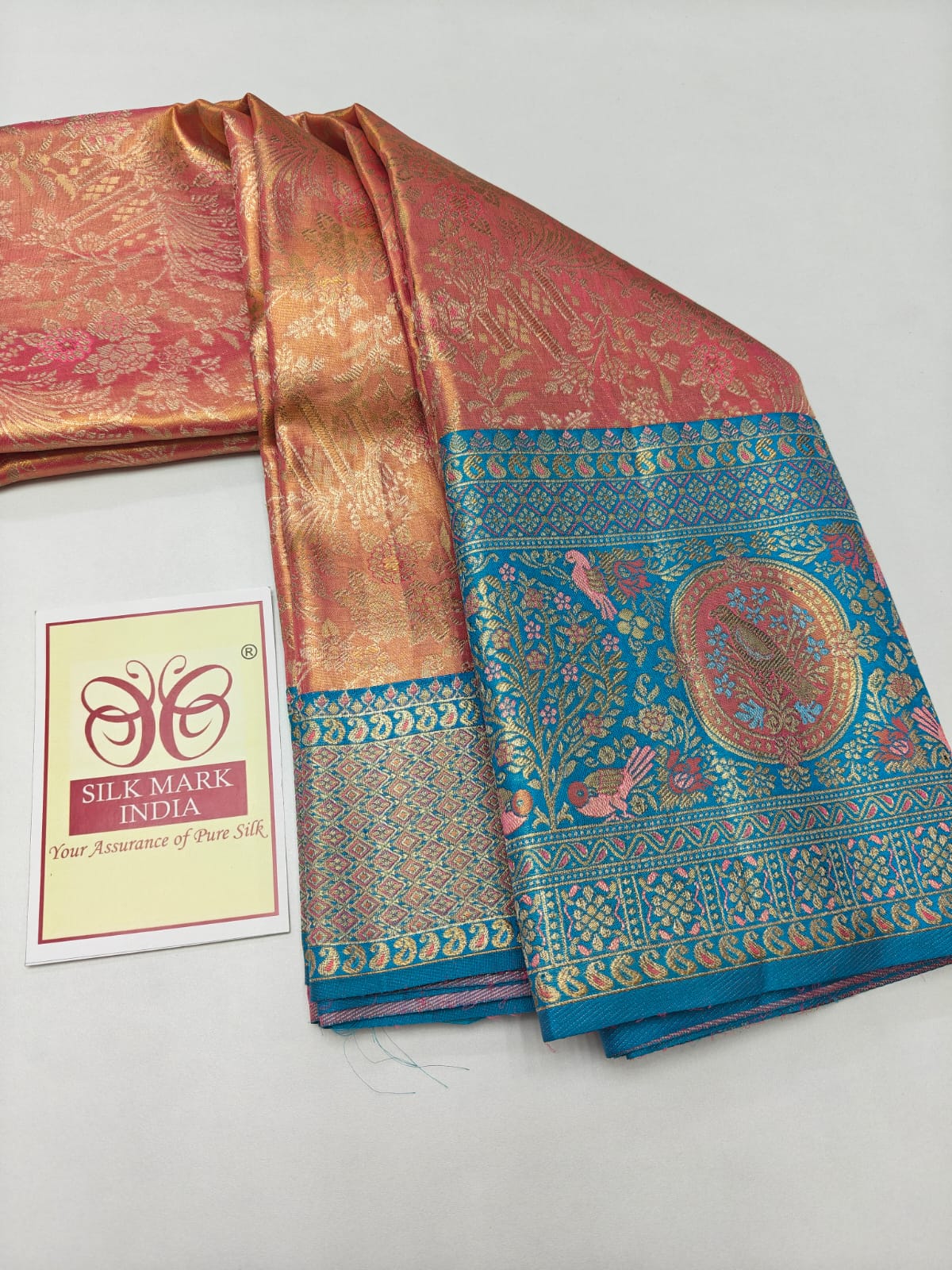 Silk Mark Certified Coral Pink & Sea Green Tissue Kanjivaram Pure Silk Saree with Meenakari Floral Jaal & Peacock Border