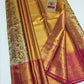 Silk Mark Certified Amber Gold & Champagne Tissue Kanjivaram Pure Silk Saree with Rani Pink Border & Floral Bird Brocade