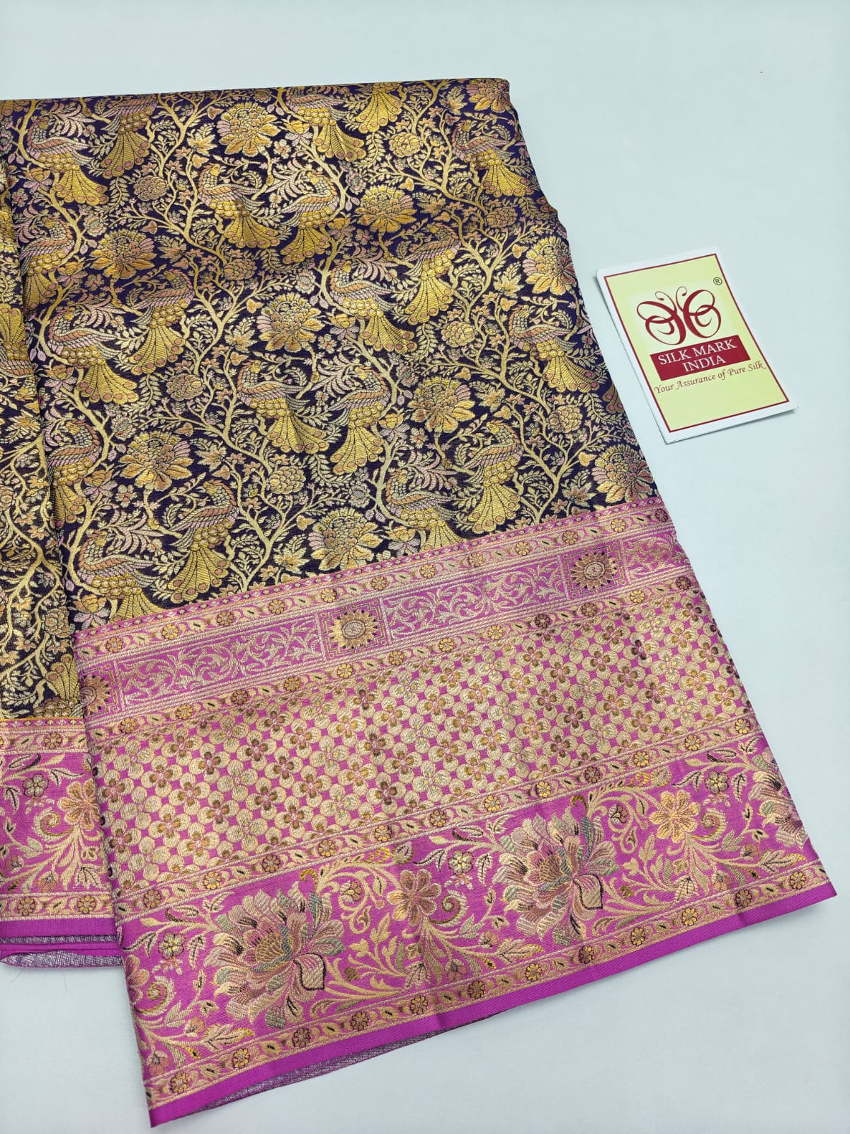 Silk Mark Certified Midnight Blue & Amber Gold Tissue Kanjivaram Pure Silk Saree with Orchid Pink Border & Peacock Floral Jaal