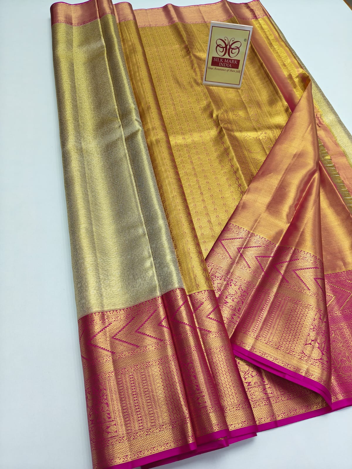 Silk Mark Certified Champagne Gold & Amber Tissue Kanjivaram Pure Silk Saree with Rani Pink Border & Geometric Chevron Brocade